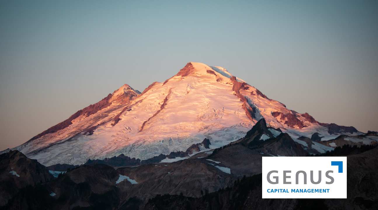 image of mountain with ice with the sun reflecting on the snow