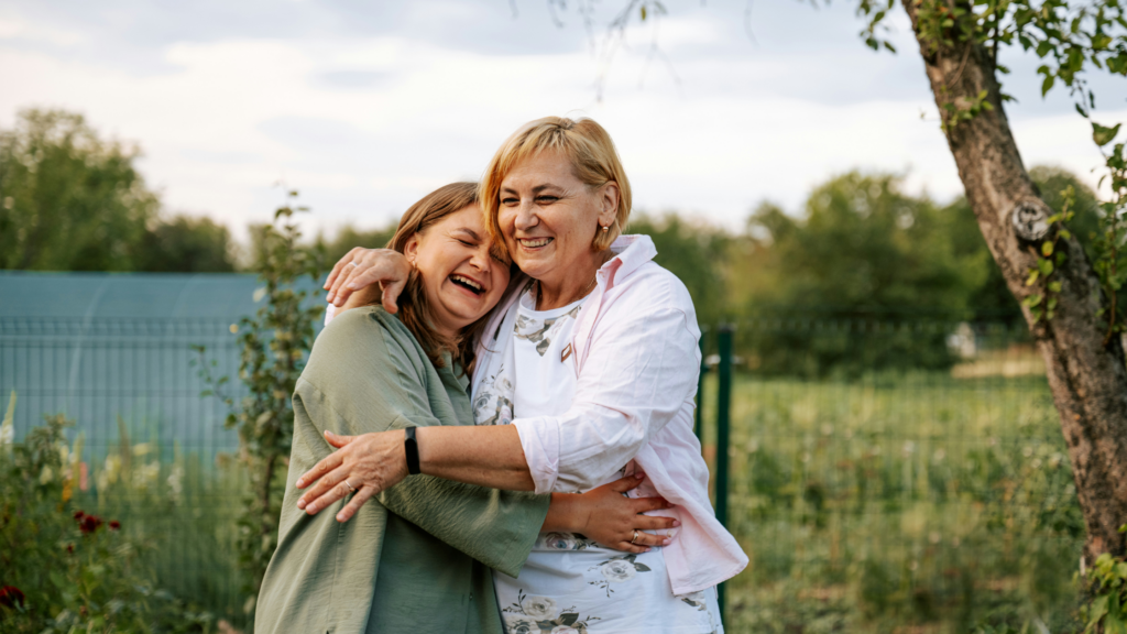parent and child hugging and laughing